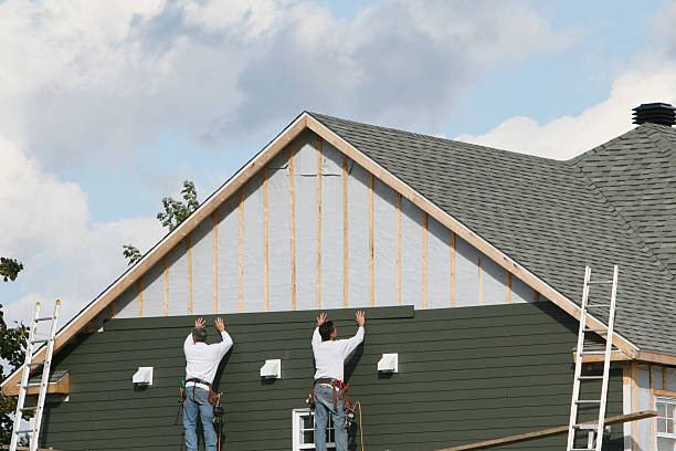 Professional Emergency Siding Repair technician working in East Fultonham, OH